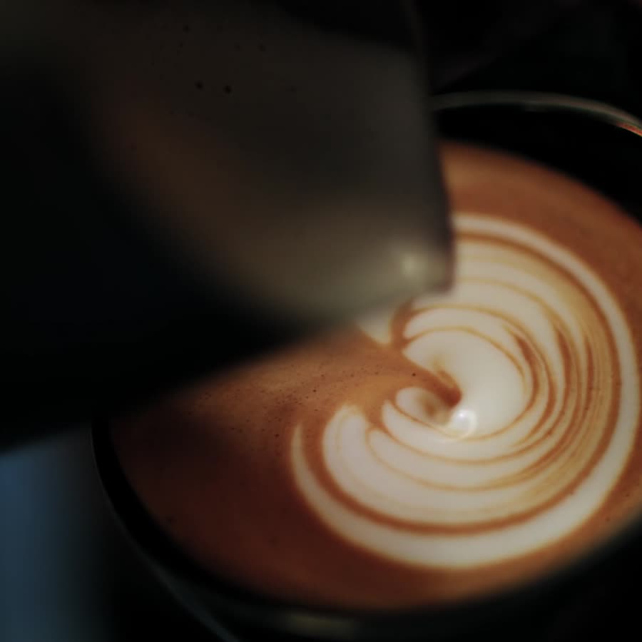 Latte art being poured